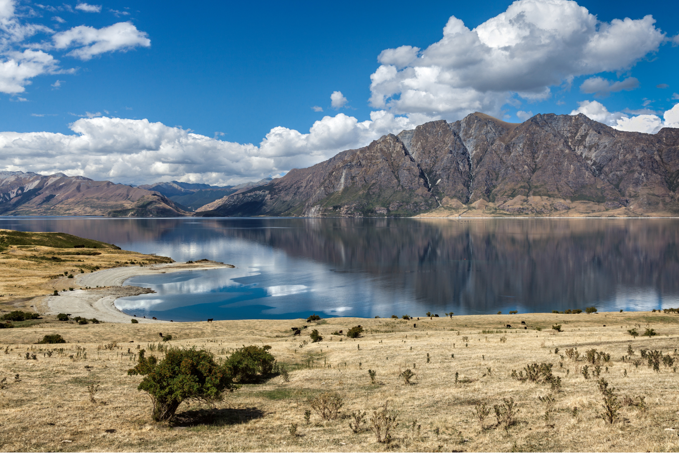 Beautiful Lake Hawea, where Derek lives after buying a house with three of his friends.